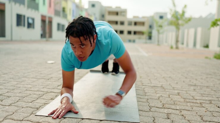 Black man, fitness or plank to push up workout