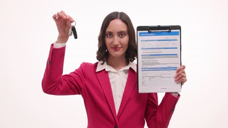 young woman holding insurance form and car keys