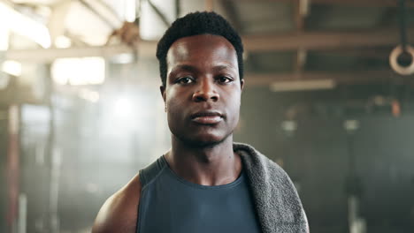 happy, fitness and face of black man at a gym