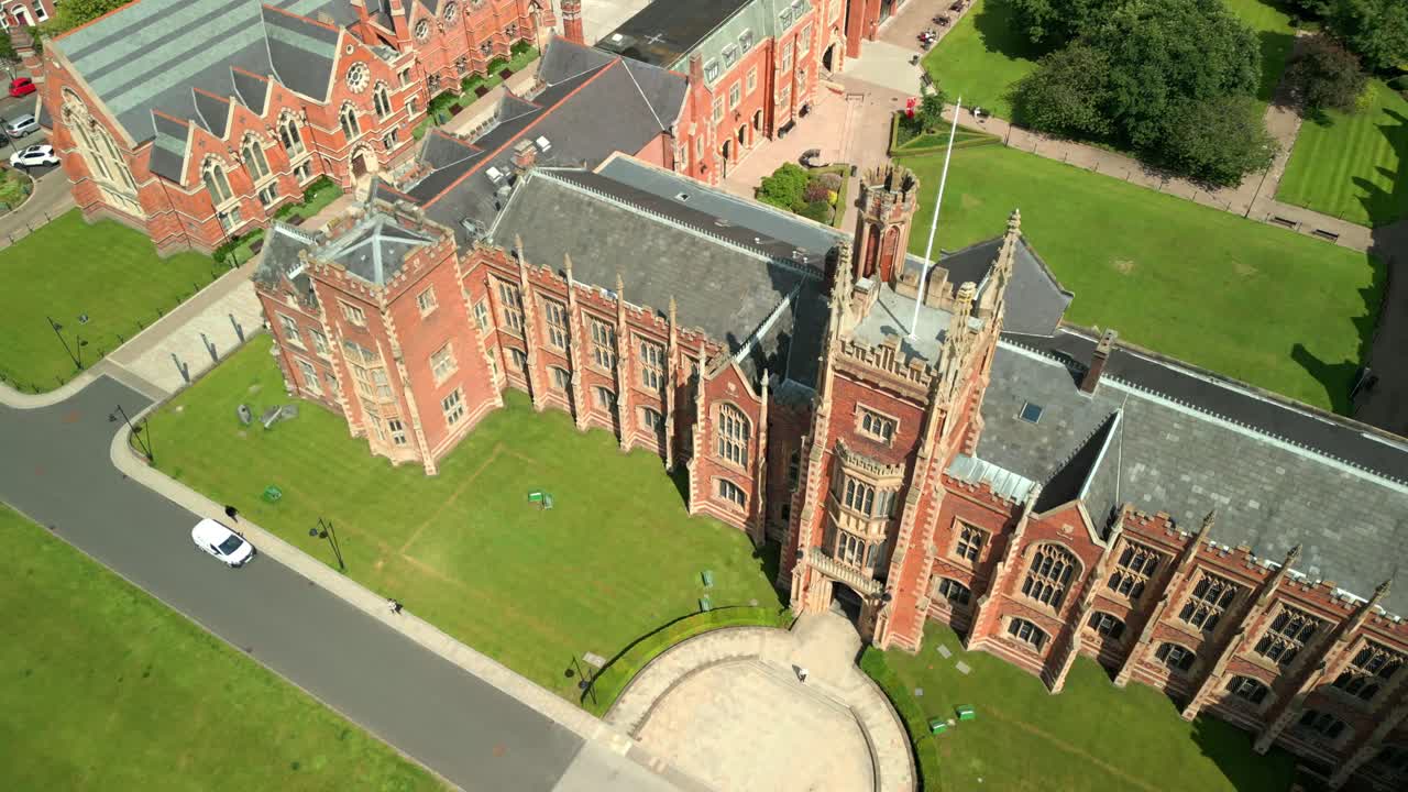 Reversing and ascending aerial video of Queen's University Belfast, in Northern Ireland, UK on a bright and sunny day. Produced at 4K resolution, 60FPS and with Rec709 color.
