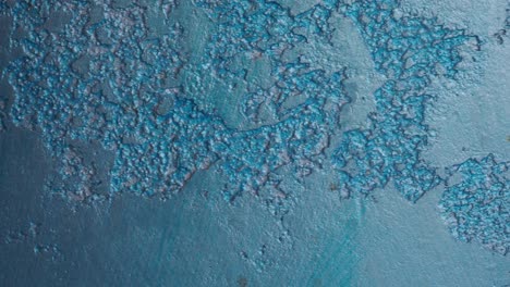 textured blue painted surface
