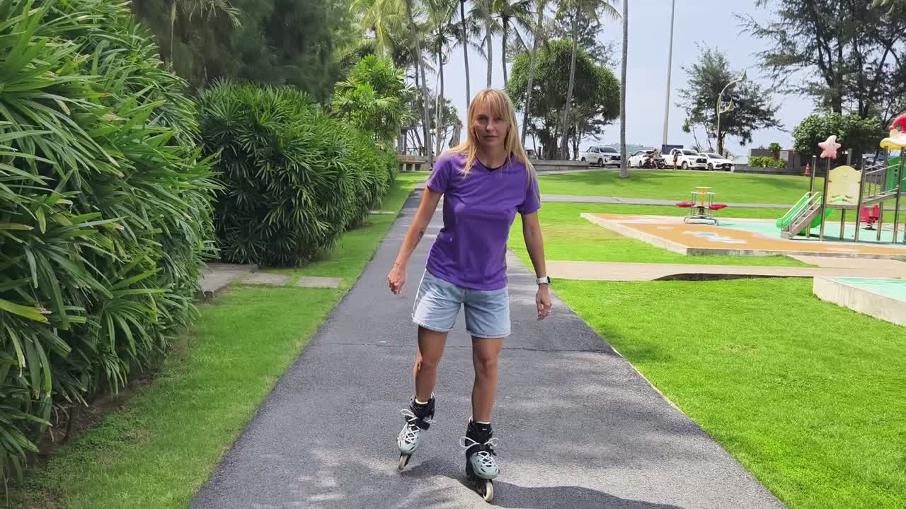 Woman Rollerblading in Park