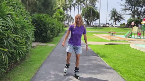 woman rollerblading in park