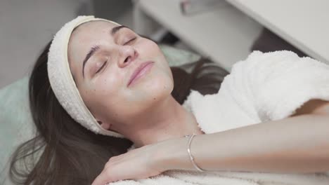 girl relaxing and having fun at the spa