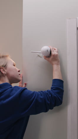 installing a wireless security camera on a wall