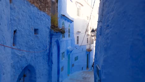 pedestal shot of blue street, chefchaouen, moroccan architecture