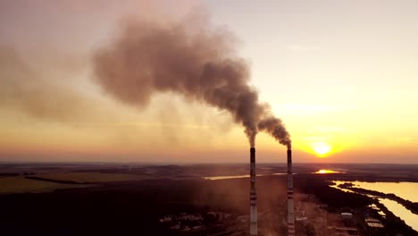 smoking pipes of factory. polluting the atmosphere with smoke