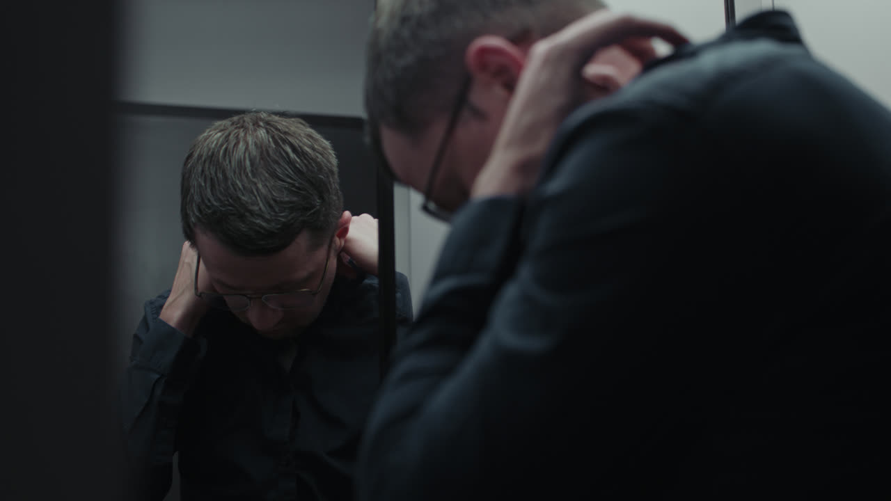 A sad man dress to work