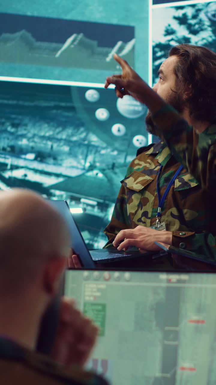 Military Analysts Discussing Strategy in High-Tech Command Center