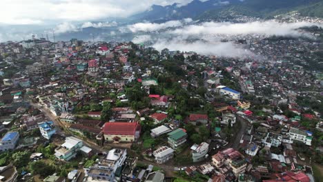 aerial shot of house build on the top of hills in nagaland, india