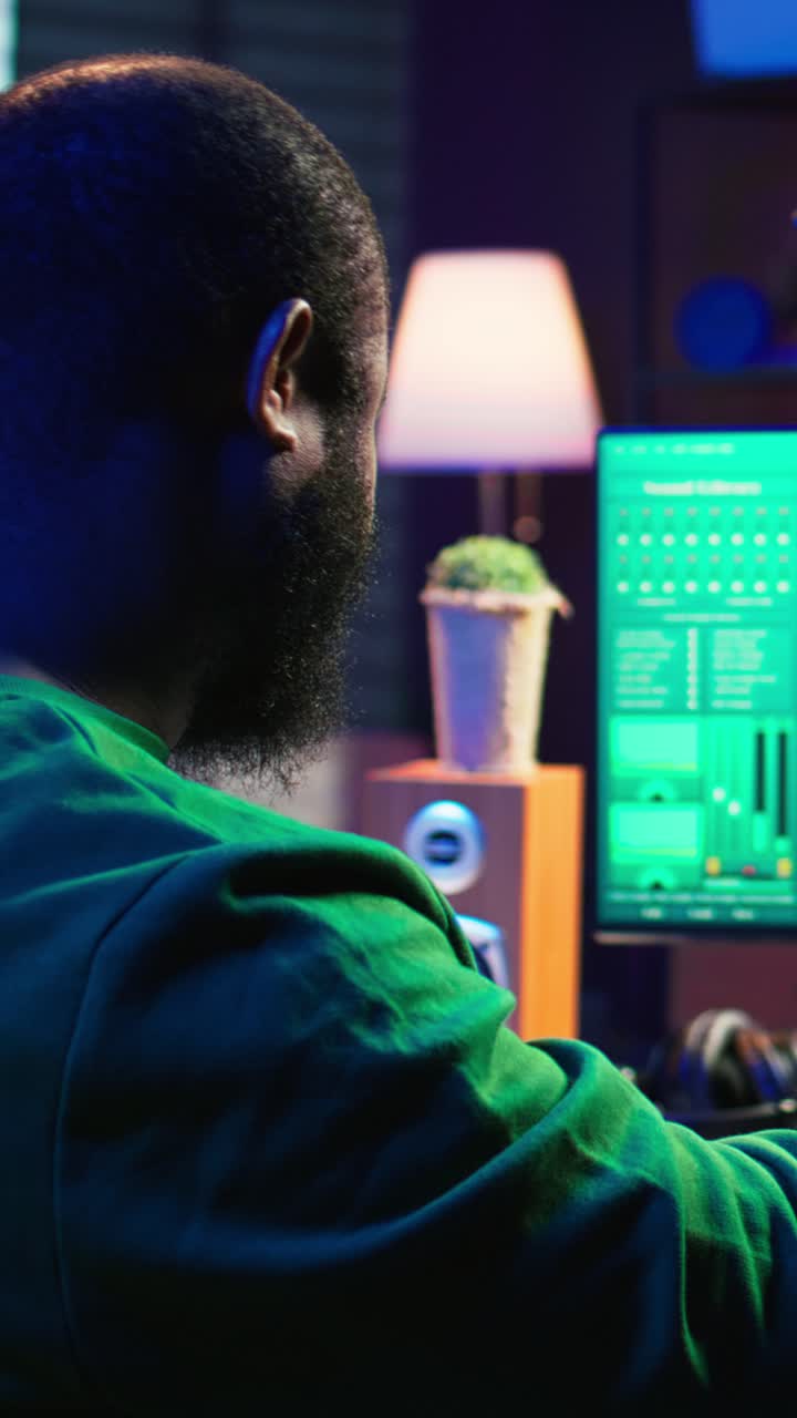 African American Man Working on Music Production in Home Studio