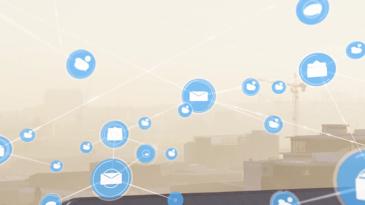 Animation of network of digital icons against aerial view of cityscape