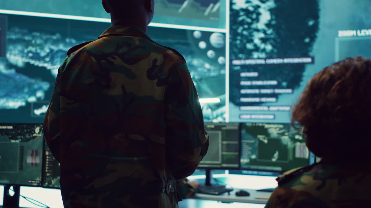 General of the army overseeing special reconnaissance mission in control center