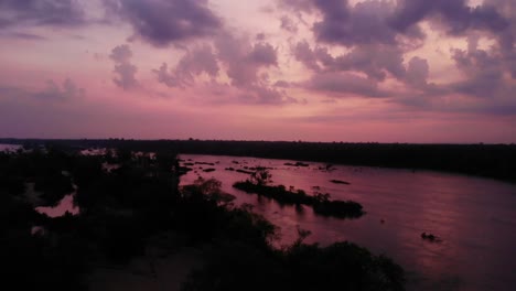 stunning purple sunset over a calm river