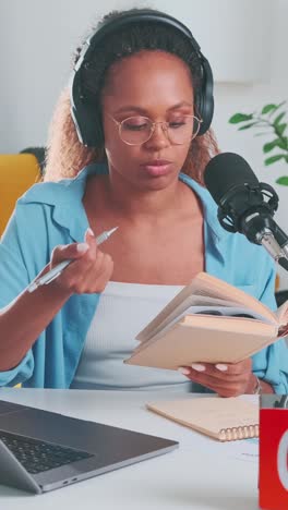 engaging book review session with a passionate reader in a cozy studio