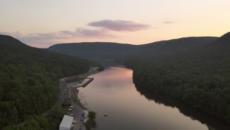 tennessee river and coastal road surrounded by forest, aerial drone view