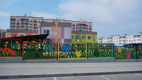 colorful kindergarten fence and play area