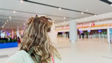 woman arriving at modern international airport
