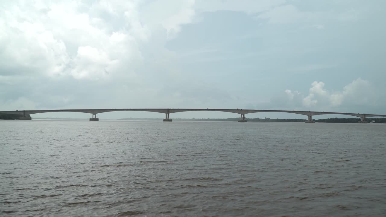 Batang Lupar Sarawak River Ferry Ride View During Summer And Under Construction Longest Bridge Conecting From each side,Sarawak,Borneo.