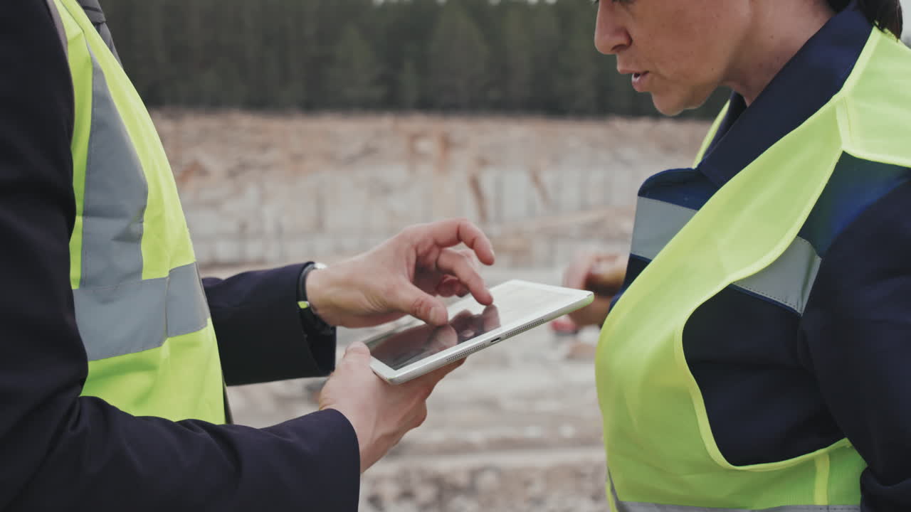 Quarry Manager and Supervisor Having Conversation