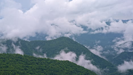 drone captures moody mist over the ancient smoky hills