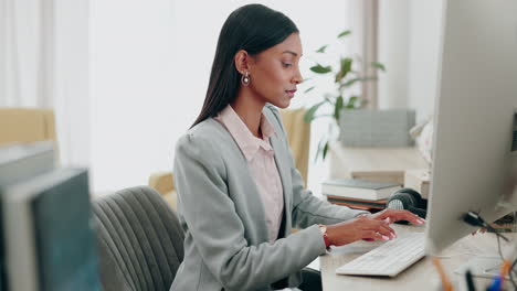 business, woman and typing report on computer