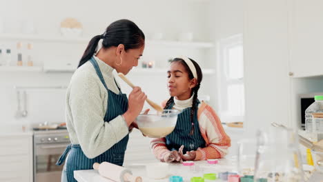 Cooking,-taste-and-mother-and-daughter-in-kitchen