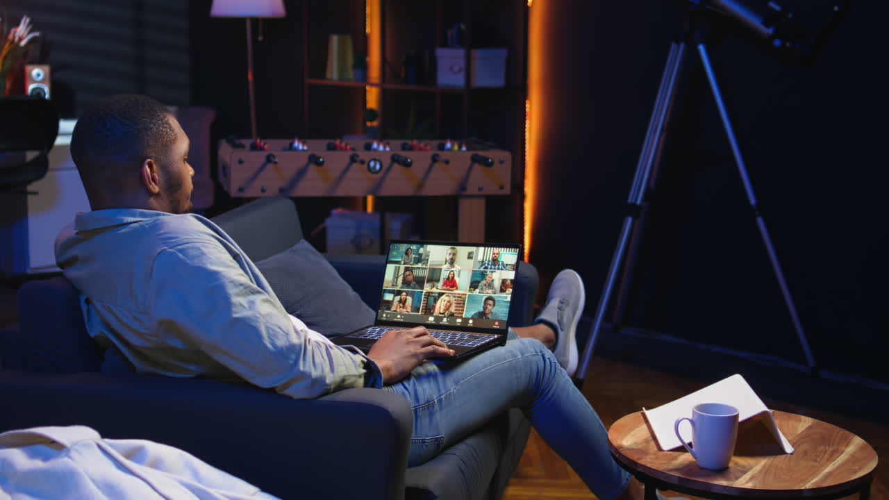 Vertical Video Confident male speaker greeting coworkers on a web video conference meeting