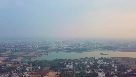 drone shot of cityscape of bangalore with kalkere lake in karnataka.