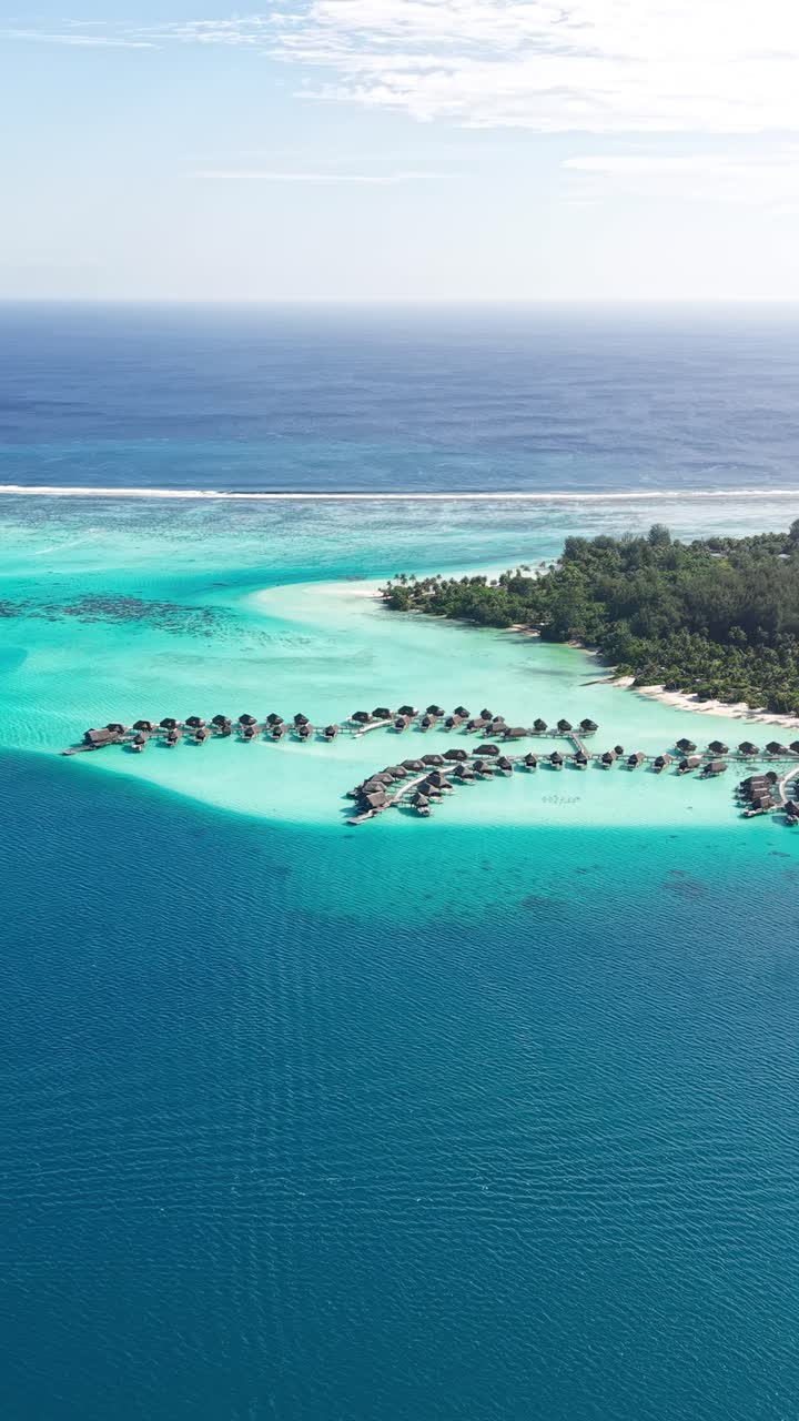 Bora Bora Island, French Polynesia. Drone Shot of Luxury Resort With Overwater Villas and Lagoon