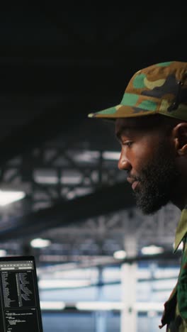 vertical video military personnel in high tech server hub overseeing ai computing operations