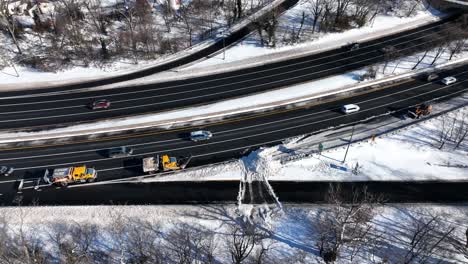 an aerial view of a highway after a heavy snowfall