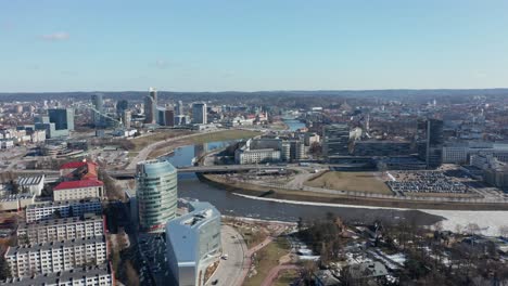 AERIAL:-Reveal-Shot-of-Vilnius-city-Panorama