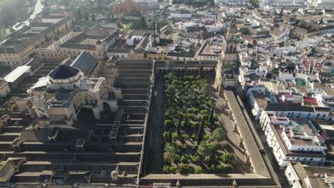 mosque or cathedral of our lady of assumption and cityscape, cordoba in spain. aerial backward