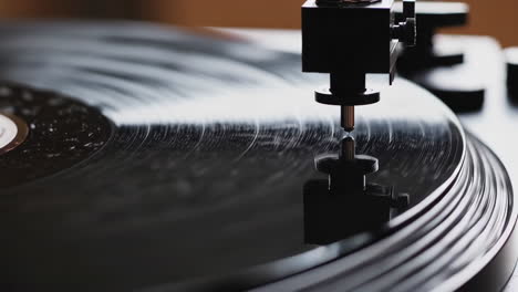 close-up of a vinyl record playing on a turntable