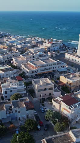 an aerial view of a city next to the adriatic sea
