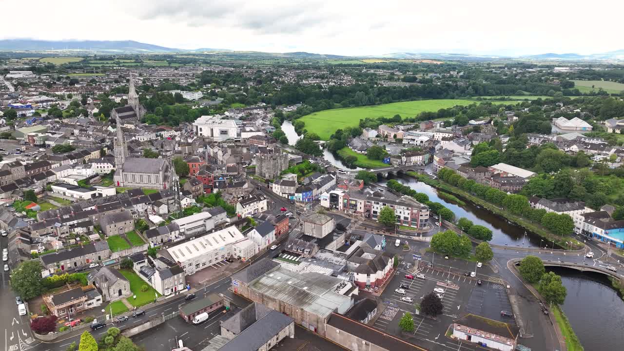 Drone view of Enniscorthy town on the river and cars ob the bridge. Ireland cityscape