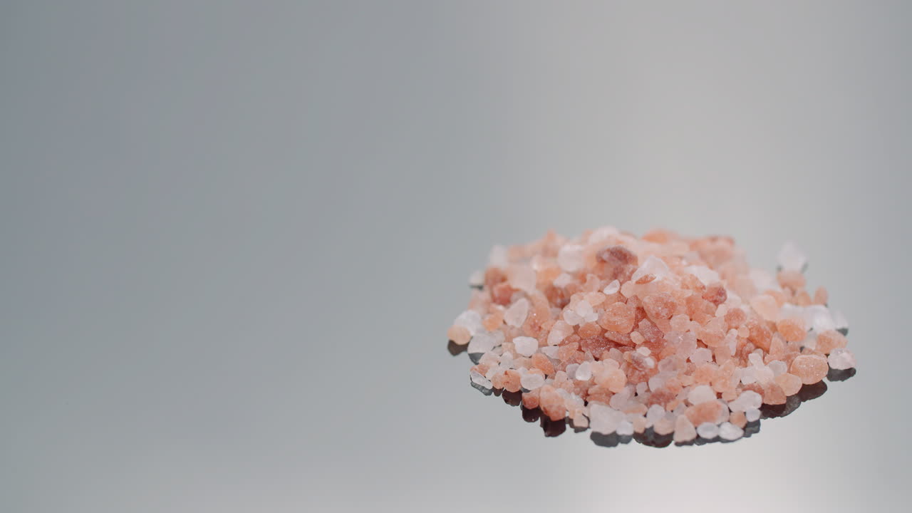 Himalayan Salt Granules in a Wooden Bowl