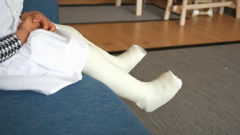 little girl with a broken leg in a cast