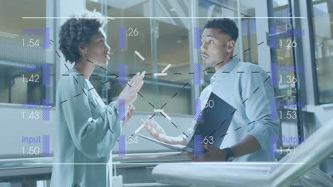 Discussing project, two business professionals with data processing animation over them