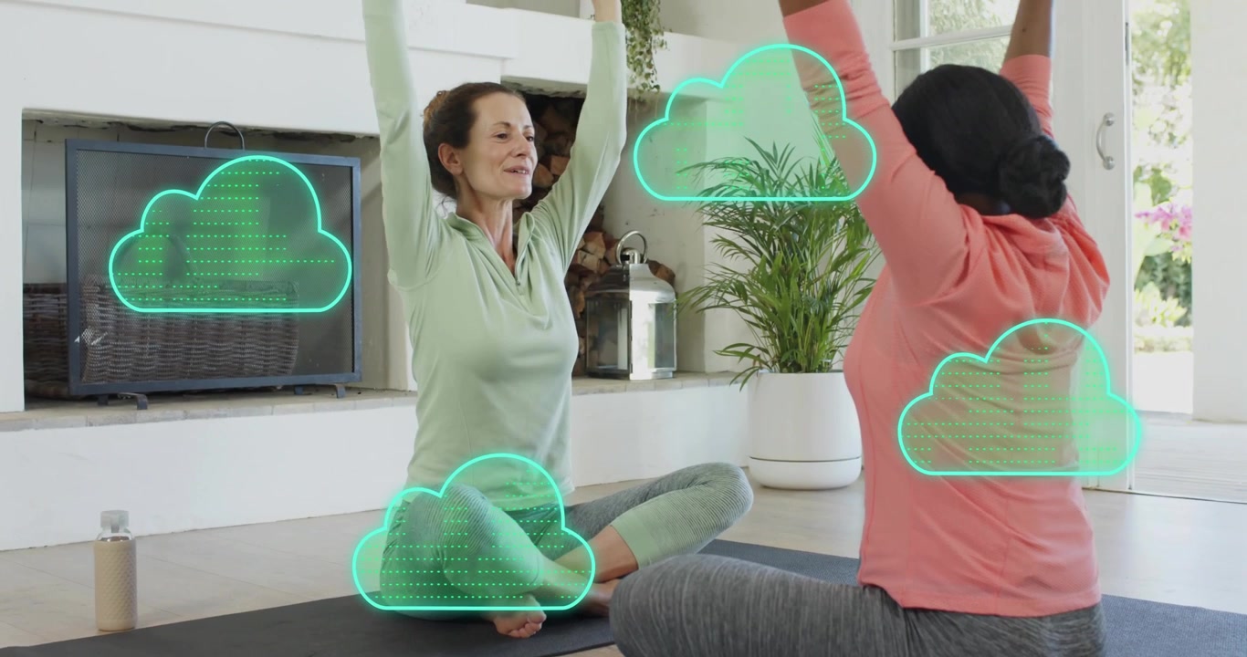 Friends raising arms on mats in living room activating cloud overlays guiding chest flow for health