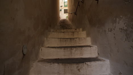 steps up a long narrow alleyway in the ancient italian village of atrani on the amalfi coast of southern italy