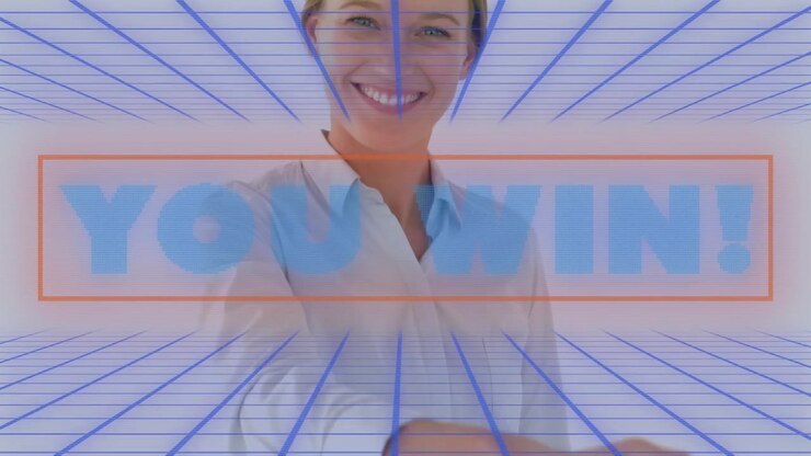 Animation of you win text over smiling businesswoman shaking hands