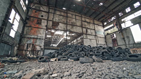 bunch of tires from wheels. pile of used tires lays at an old dump