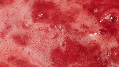 boiling red fruit jam