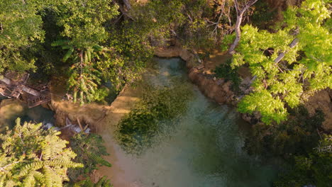 hidden tropical waterfall in the jungle