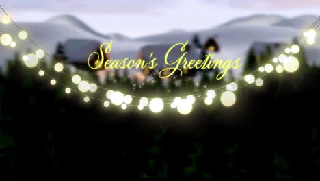 animation of christmas seasons greetings and glowing fairy lights over winter landscape