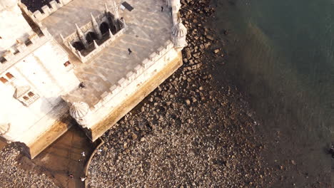 Aerial-top-view-of-Torre-de-Belém's-intricate-architecture,-Portugal