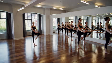 barre class in a modern dance studio