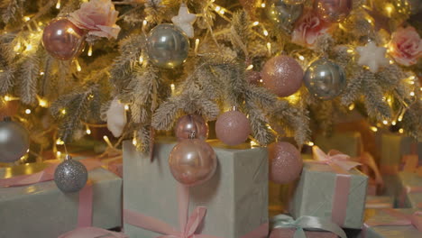 wrapped gifts under the decorated christmas tree